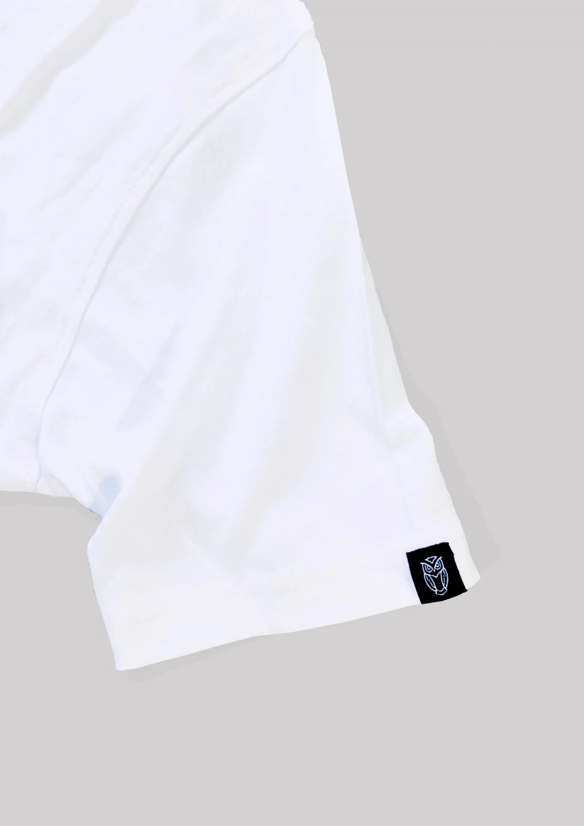 white fabric rareout hem tag