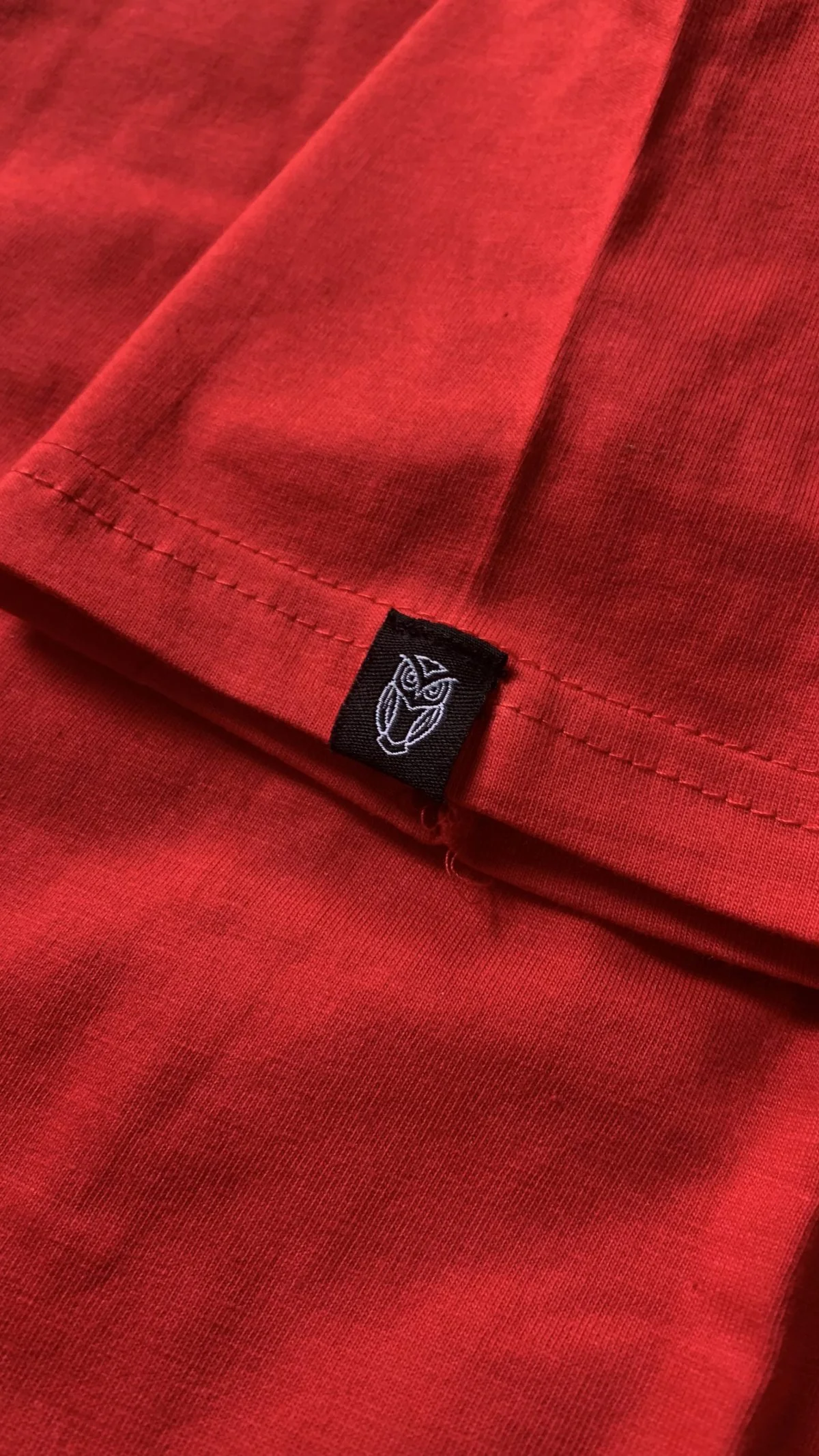 Red fabric rareout hem tag