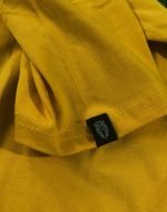 Mustard fabric rareout hem tag