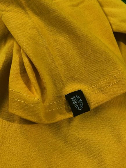 Mustard fabric rareout hem tag